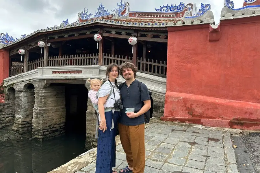 Couple visiting Japanese Covered Bridge in Hoi An during central Vietnam trip from da nang tours