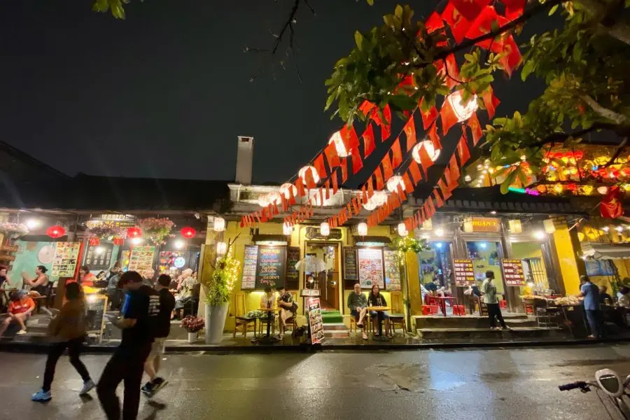 Hoi An lantern street at night with vibrant lights – popular stop in danang tours itinerary