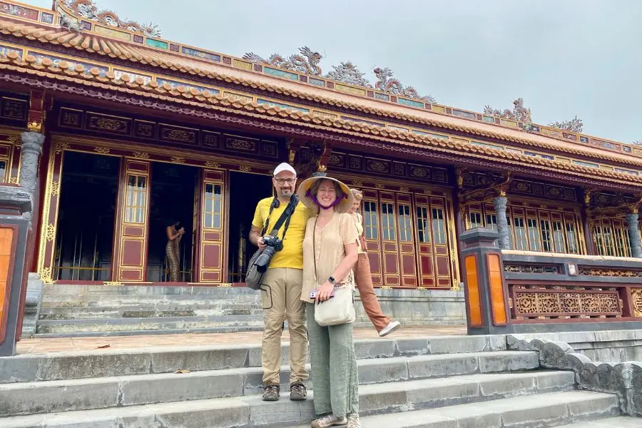 Travelers exploring Hue Imperial architecture on a cultural day trip from da nang tours